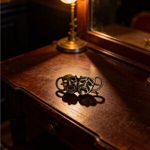 Dramatic Gold theater masks pin